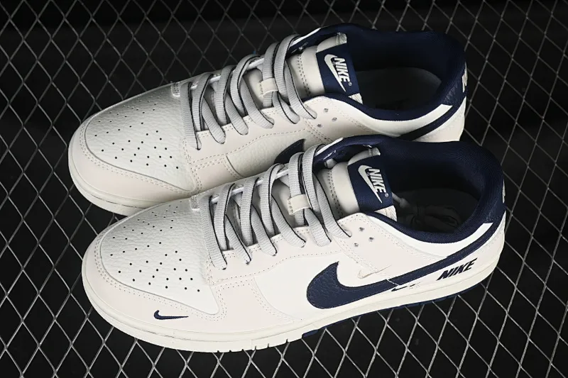 All Categories Nk SB Dunk Series Nk SB Dunk Low High-end Customized Low-top Shoes Nike SB Dunk Low Joint Three Hooks Milk White Dark Blue Anniversary High-end Customized Low-top Casual Shoes SC9207-402